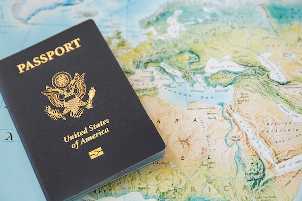 passport standing on a map